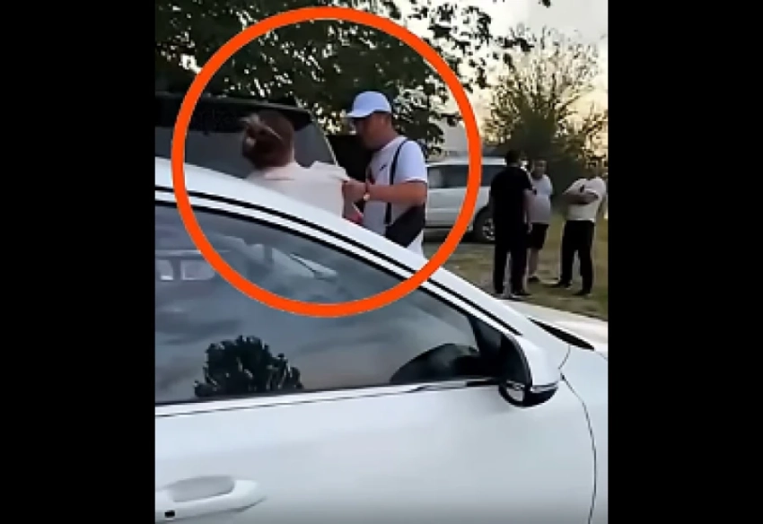 Милиционер в Бишкеке ударил женщину по лицу