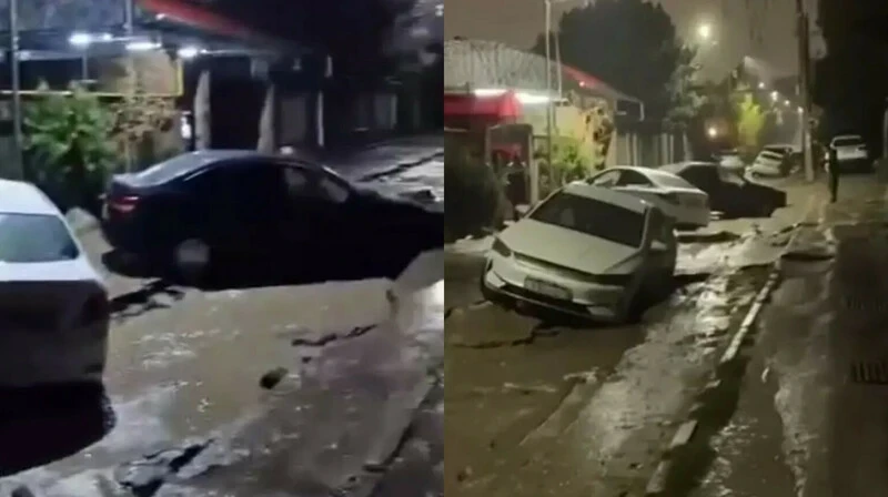 Проливной дождь размыл дороги в Алматы, провалилось 13 машин. Видео